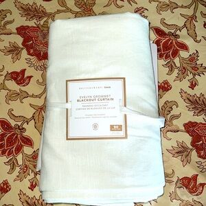 New Pottery Barn Evelyn Grommet Blackout Curtin pane. Size  54” wide & 90” long.
